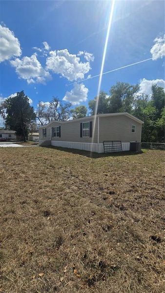 Exterior details and patio area of a home in , New Port Richey (Image 12).