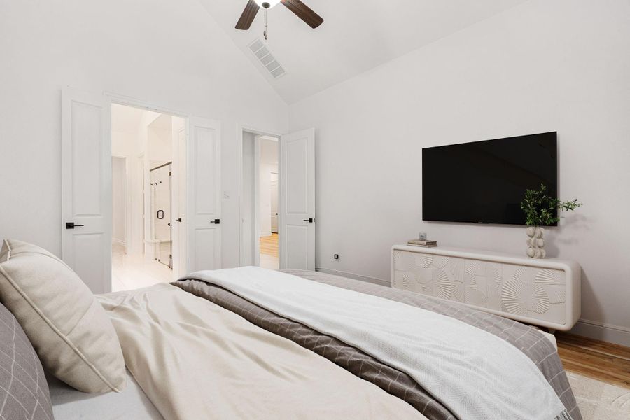 The primary bedroom provides a bright and inviting space with tall ceilings and an open feel.