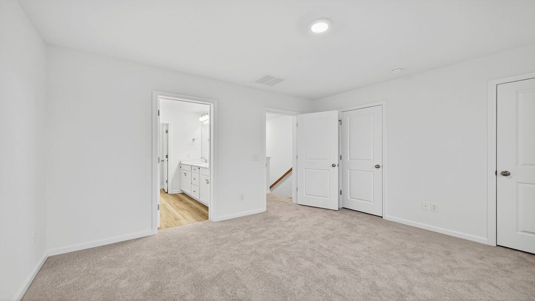 Furnished interior view inside a new home in Clear Springs Townhomes, North Charleston (Image 9).