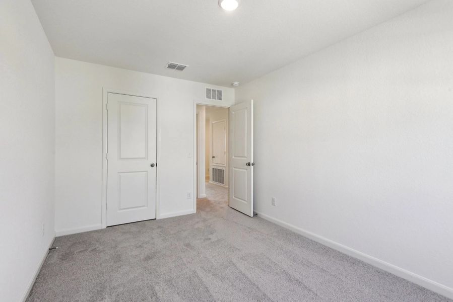 Representative unfurnished interior of a home built from the Compass by Starlight Homes in The Wilder, Adkins (Image 21).