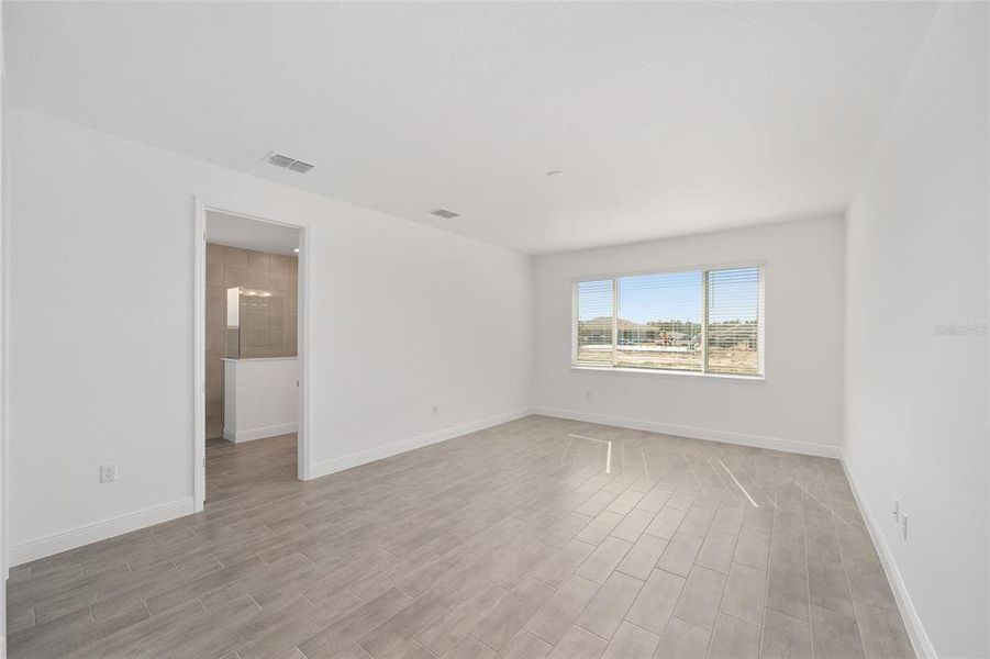 Spacious, unfurnished interior of a new home in On Top of the World Communities, Ocala (Image 32).