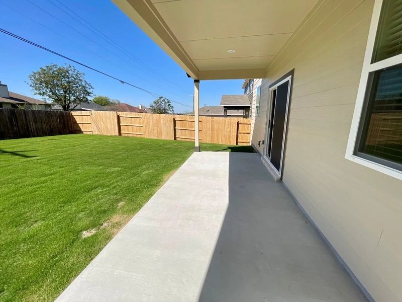Exterior details and patio area of a home in Covered Bridge, Hutto (Image 4). Exterior details and patio area of a home in Covered Bridge, Hutto (Image 4).