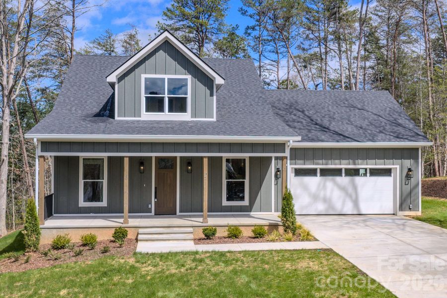 Front exterior of a new home in , Asheville, NC, highlighting curb appeal (Image 19).