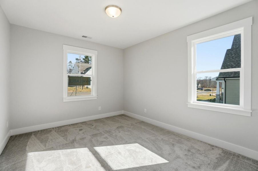 Spacious, unfurnished interior of a new home in Rone Creek, Waxhaw (Image 25).