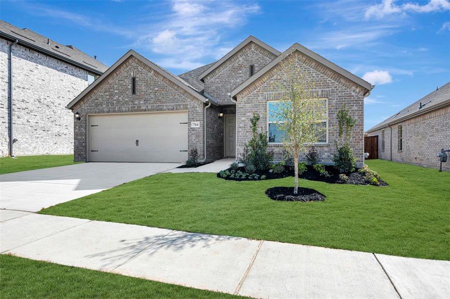 Front exterior of a new home in Elevon, Lavon, TX, highlighting curb appeal (Image 22).