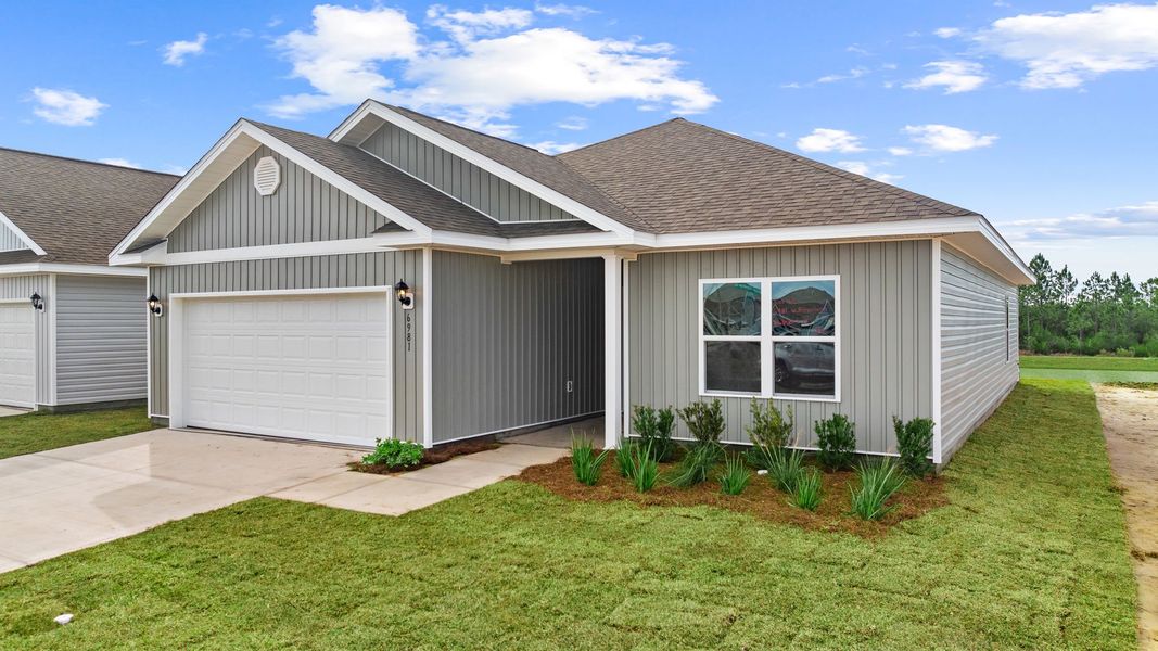Front exterior of a new home in Liberty, Panama City, FL, highlighting curb appeal (Image 1). Front exterior of a new home in Liberty, Panama City, FL, highlighting curb appeal (Image 1).