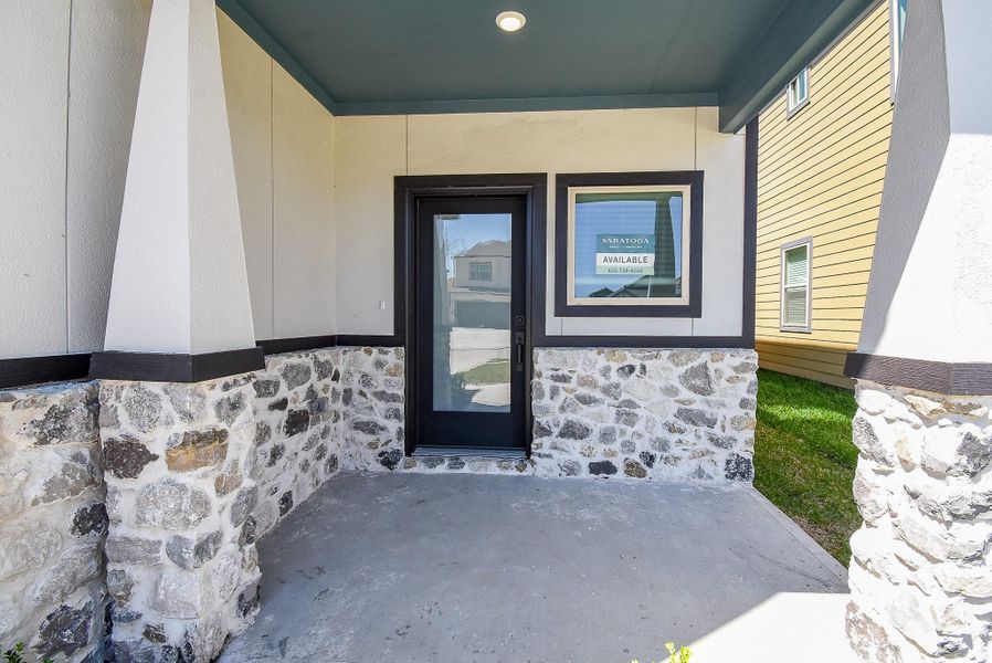 Exterior details and patio area of a home in Glendale Lakes, Arcola (Image 26).