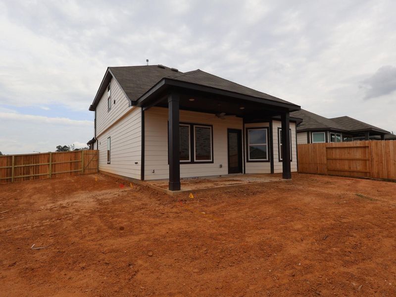 Exterior details and patio area of a home in Moran Ranch, Willis (Image 4).