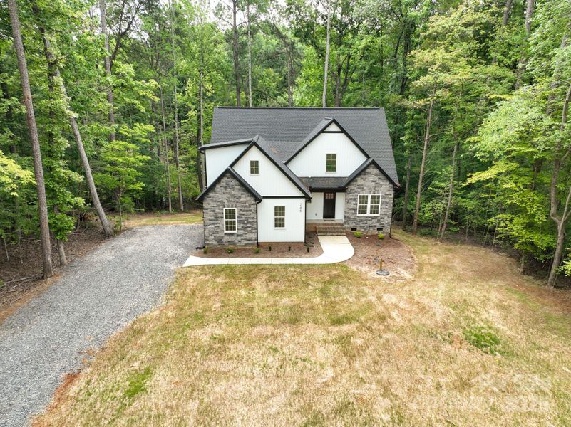 Front exterior of a new home in , Mount Gilead, NC, highlighting curb appeal (Image 16).