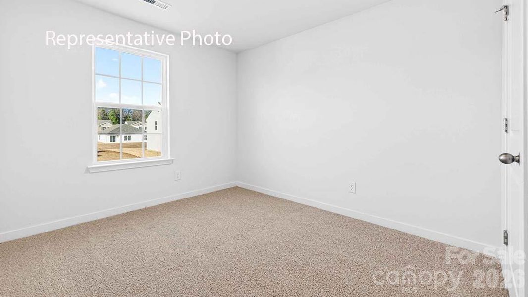 Spacious, unfurnished interior of a new home in Fergus Crossing, York (Image 20).
