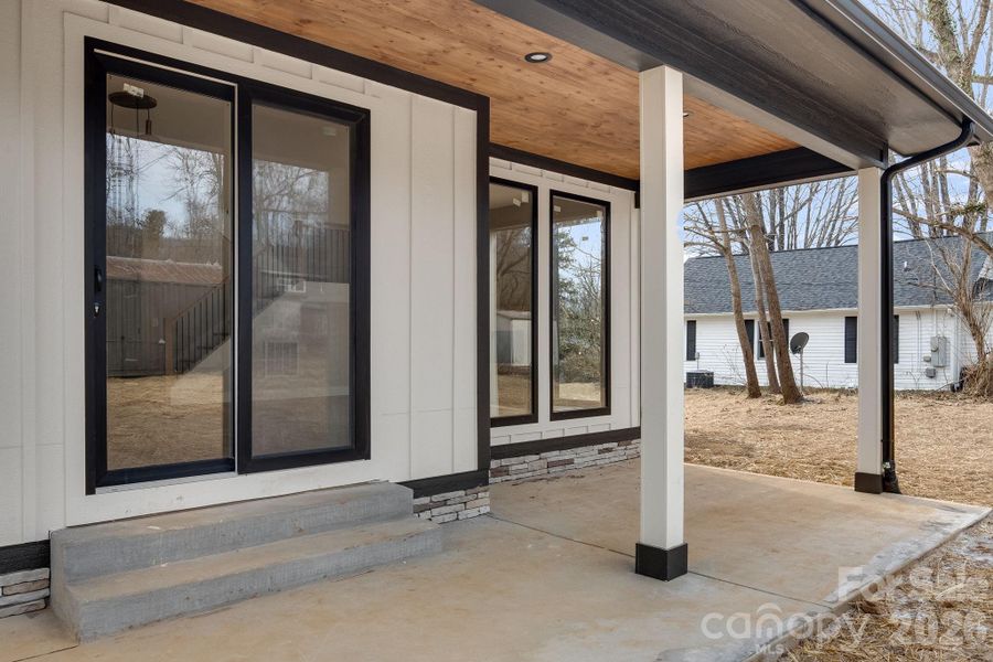 Exterior details and patio area of a home in , Black Mountain (Image 27).