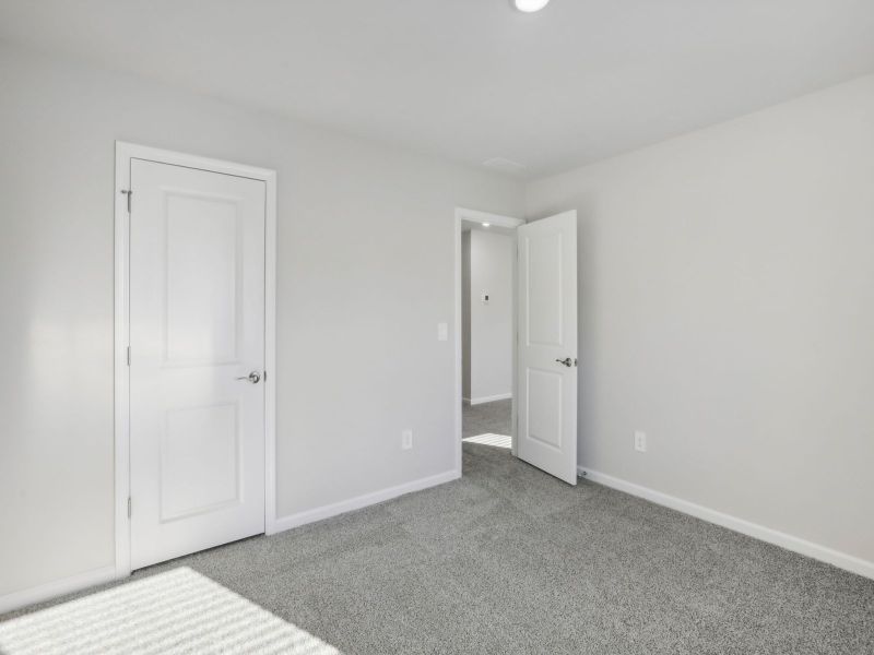 Secondary bedroom in the Chatham floorplan at 250 White Birch Lane in Angier, NC.