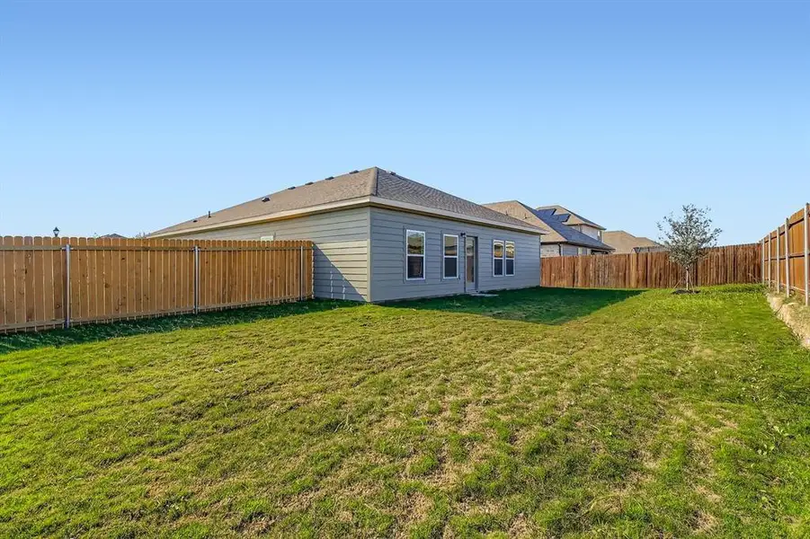 Exterior details and patio area of a home in MiraVerde, Crowley (Image 3).