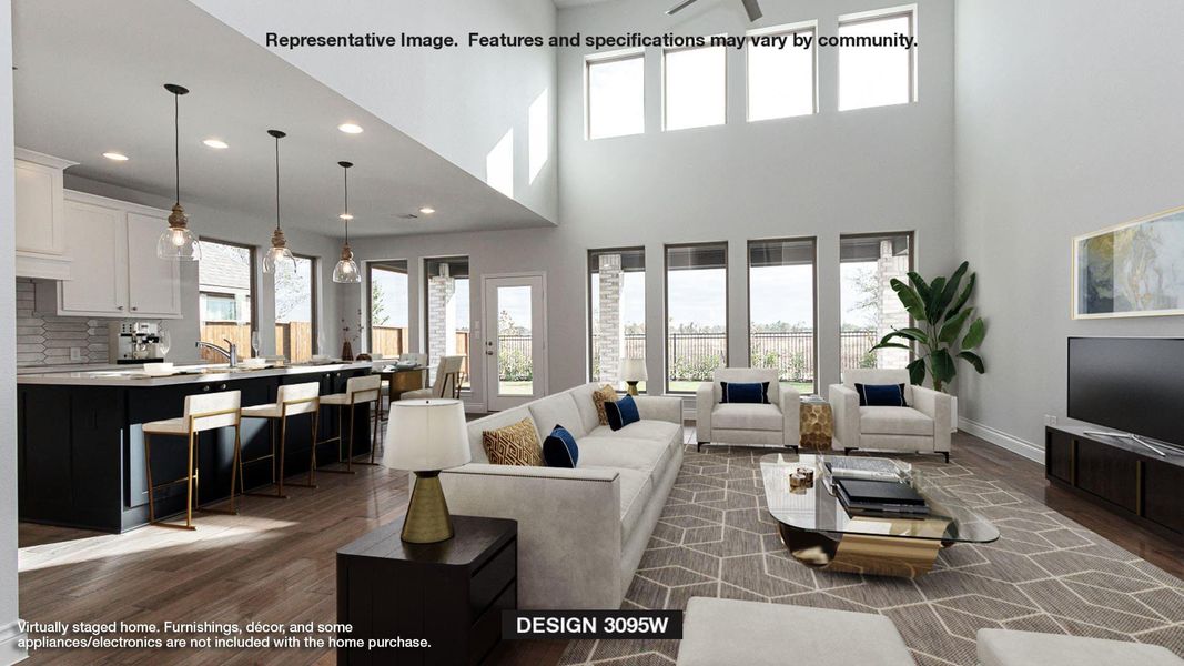 Living room with wood finished floors, a towering ceiling, and recessed lighting