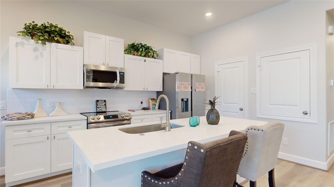 Furnished interior view inside a new home in , The Woodlands (Image 11).