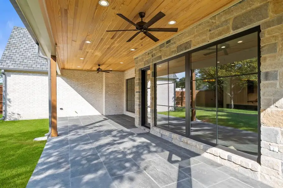 View of patio featuring a ceiling fan View of patio featuring a ceiling fan