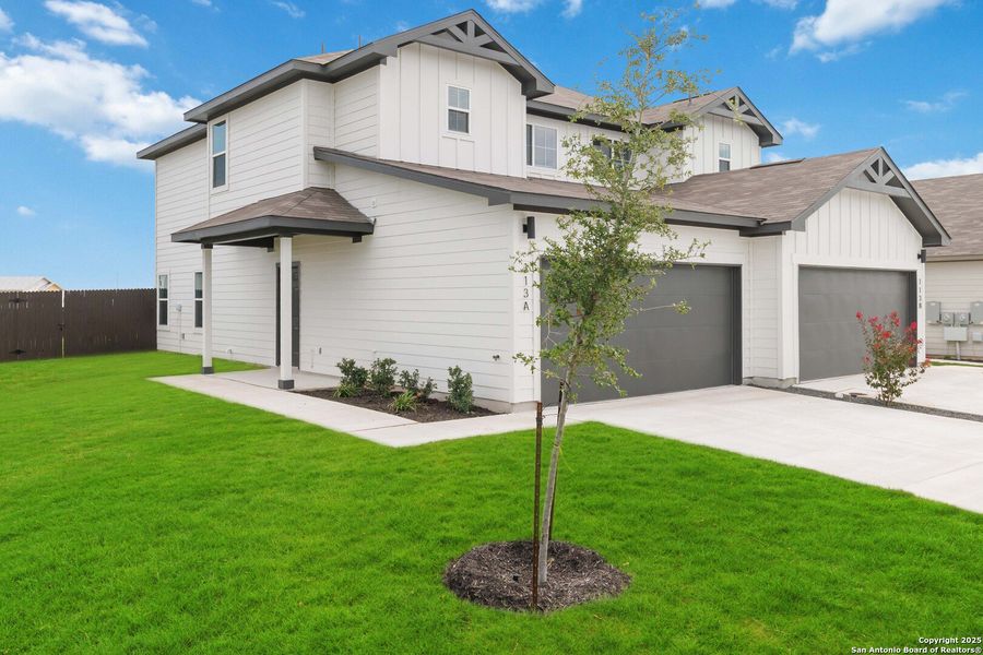 Front exterior of a new home in , Converse, TX, highlighting curb appeal (Image 2).