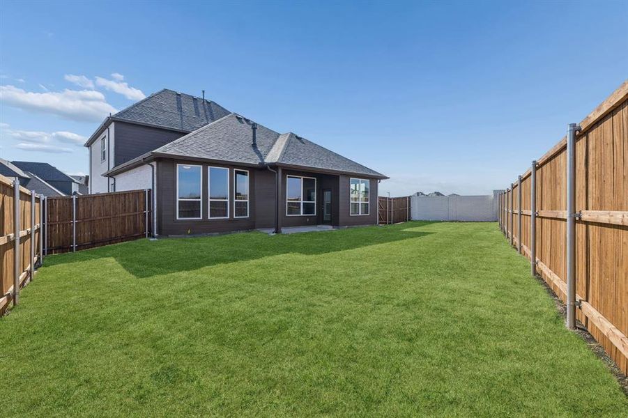 Exterior details and patio area of a home in Venetian, Weston (Image 19).