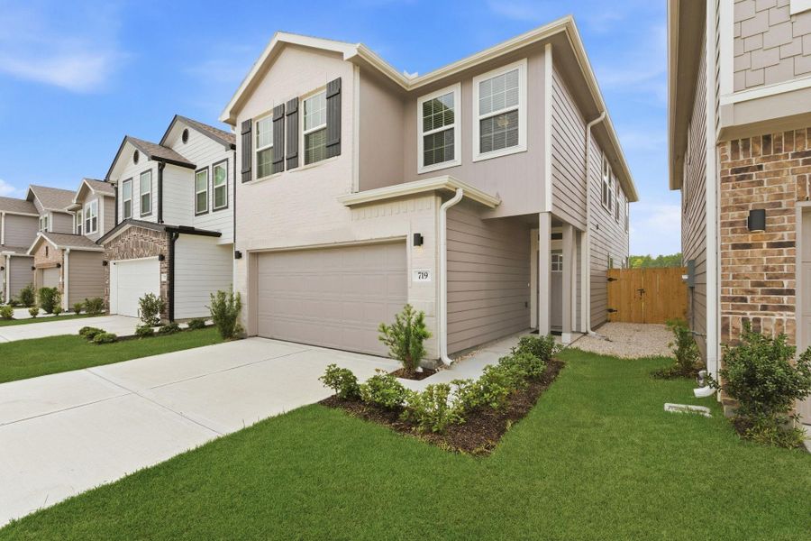 Front exterior of a new home in , Houston, TX, highlighting curb appeal (Image 27). Front exterior of a new home in , Houston, TX, highlighting curb appeal (Image 27).