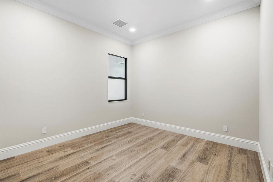 Spacious, unfurnished interior of a new home in Seaglass, Wabasso Beach (Image 26).