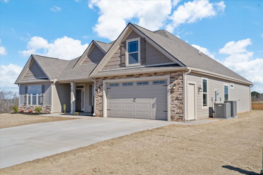 Representative exterior photo of a completed home built from the Converse by Enchanted Homes in Messer Farms, Inman, SC (Image 27).