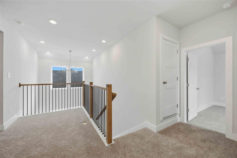 Spacious, unfurnished interior of a new home in Ellwood, Iowa Colony (Image 13).