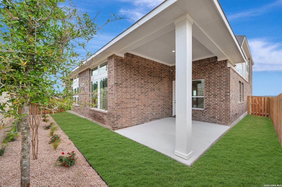 Exterior details and patio area of a home in Windsong - Legacy Series, Boerne (Image 27).