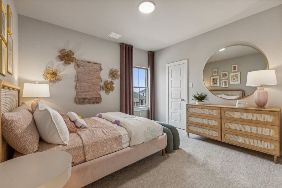 Bedroom in the Stanley II home plan by Trophy Signature Homes – REPRESENTATIVE PHOTO