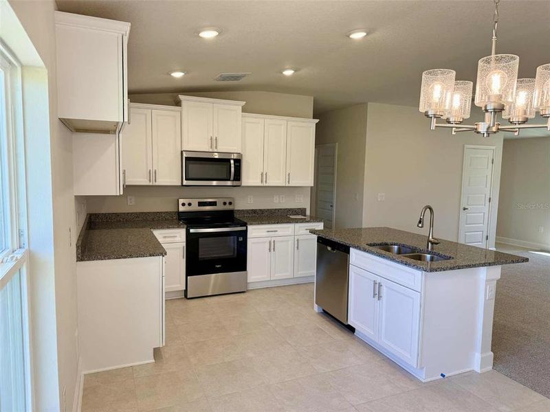 Furnished interior view inside a new home in , St. Cloud (Image 2).