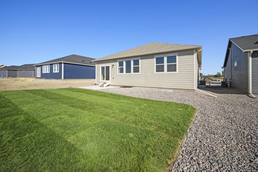 Exterior details and patio area of a home in The Glen-12, Colorado Springs (Image 4). Exterior details and patio area of a home in The Glen-12, Colorado Springs (Image 4).