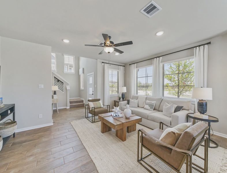 Representative furnished interior of a home built from the Riverdale by Chesmar Homes in Sienna Courtyard, Missouri City (Image 4).