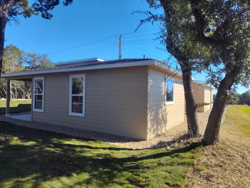 View of home's exterior with a lawn View of home's exterior with a lawn