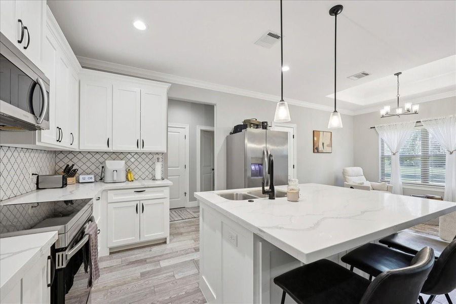 Furnished interior view inside a new home in , Orange (Image 5). Furnished interior view inside a new home in , Orange (Image 5).