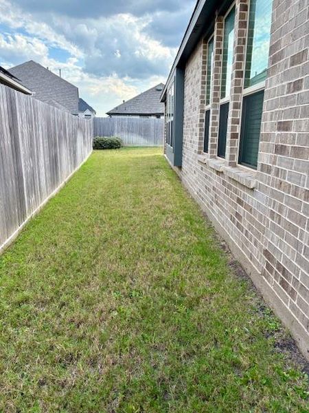 Exterior details and patio area of a home in , Richmond (Image 2). Exterior details and patio area of a home in , Richmond (Image 2).