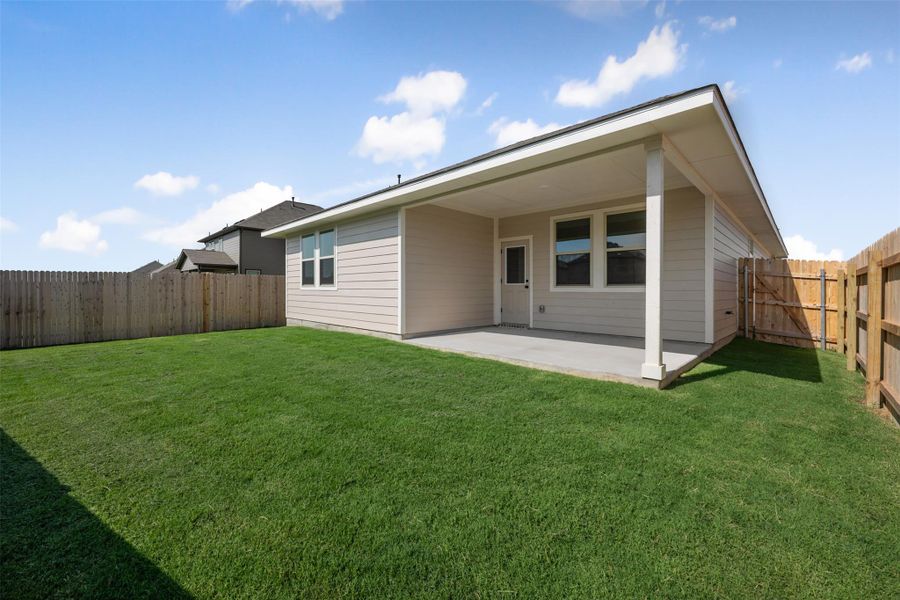 Front exterior of a new home in Rolling Glen, Hutto, TX, highlighting curb appeal (Image 25). Front exterior of a new home in Rolling Glen, Hutto, TX, highlighting curb appeal (Image 25).