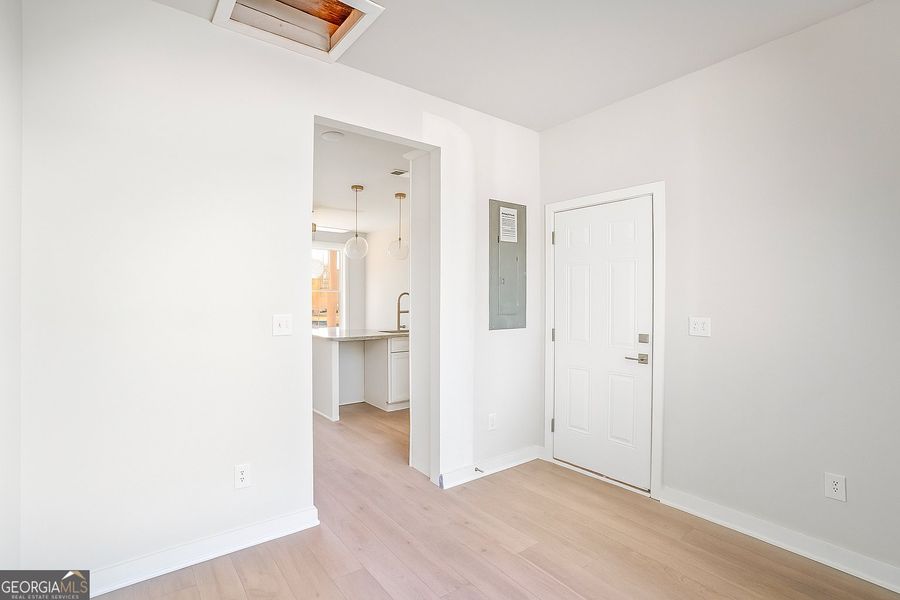 Spacious, unfurnished interior of a new home in The Cottages at East Lanier, Fayetteville (Image 11).