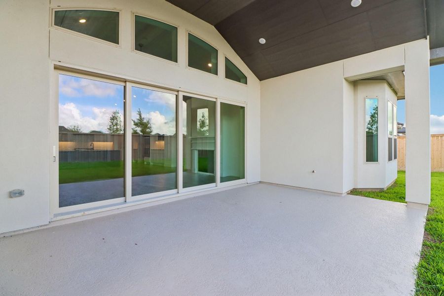 Exterior details and patio area of a home in The Grand Prairie 60', Hockley (Image 3).