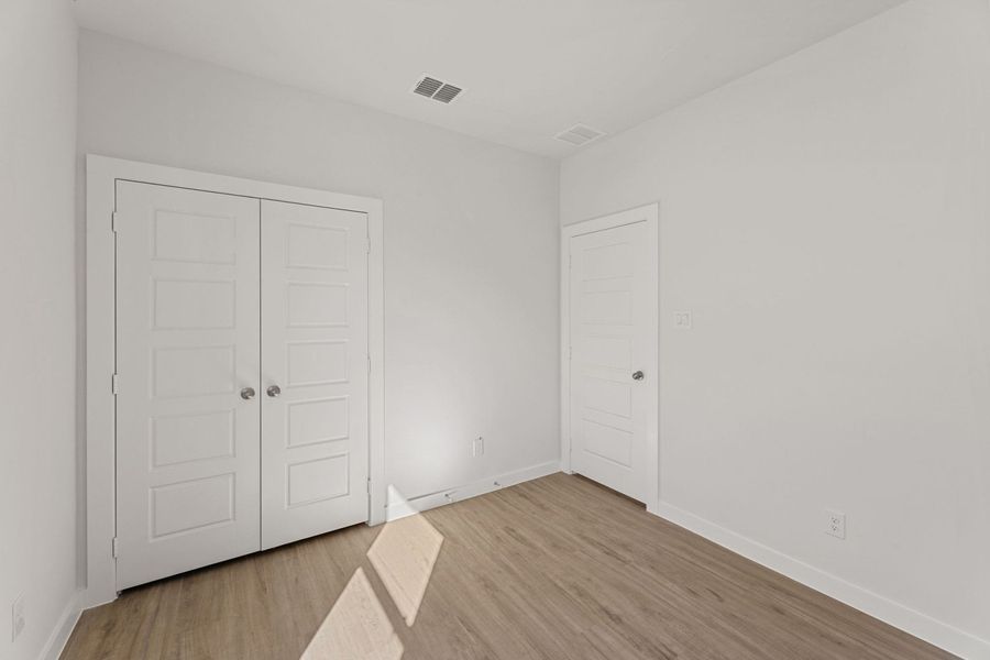 Representative unfurnished interior of a home built from the Clovis by Hakes Brothers in Hunters Ranch, San Antonio (Image 24).