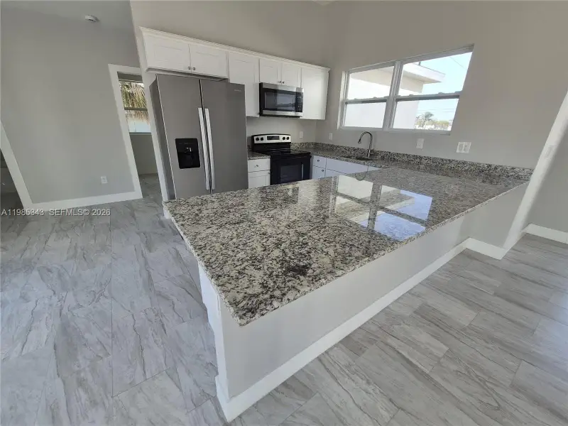 Furnished interior view inside a new home in , Cape Coral (Image 8).