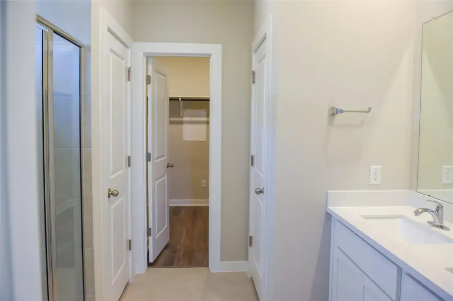 Primary Bath retreat with dual vanities & walk-in shower Primary Bath retreat with dual vanities & walk-in shower