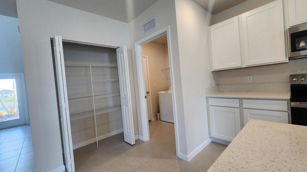 Furnished interior view inside a new home in , Fort Pierce (Image 8).