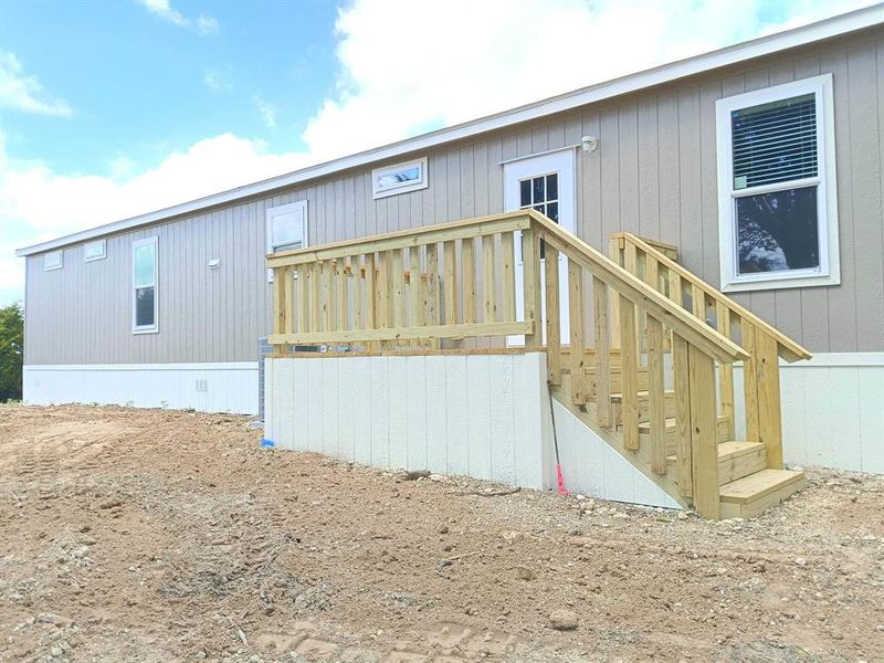 Exterior details and patio area of a home in , Springtown (Image 11).