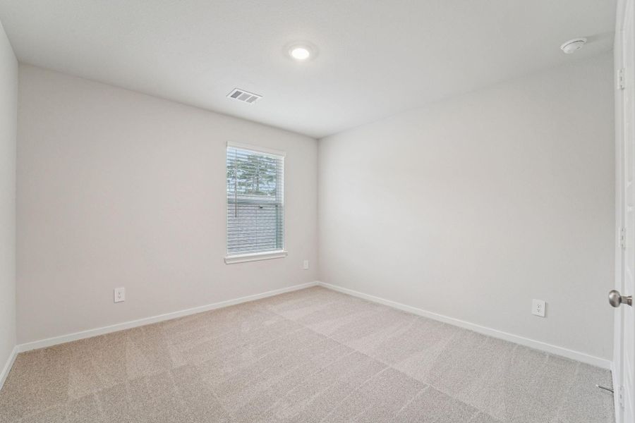 Spacious, unfurnished interior of a new home in Granger Pointe - Premier Series, Conroe (Image 31).