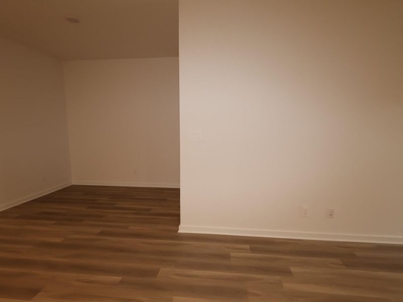 Spacious, unfurnished interior of a new home in Pinewood at Grand Texas, New Caney (Image 11).