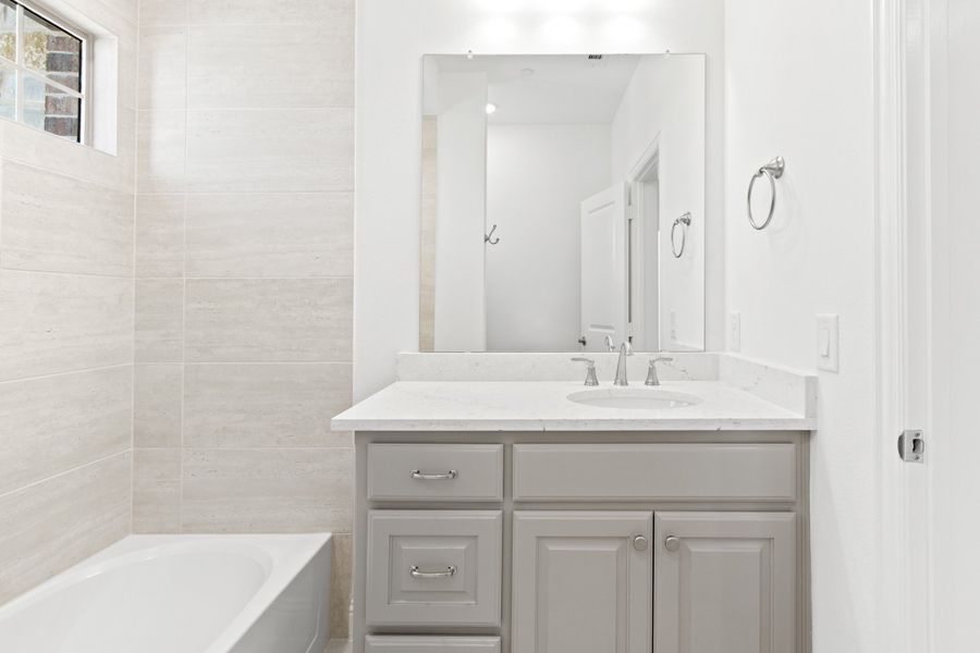 Furnished interior view inside a new home in The Tribute, The Colony (Image 30).