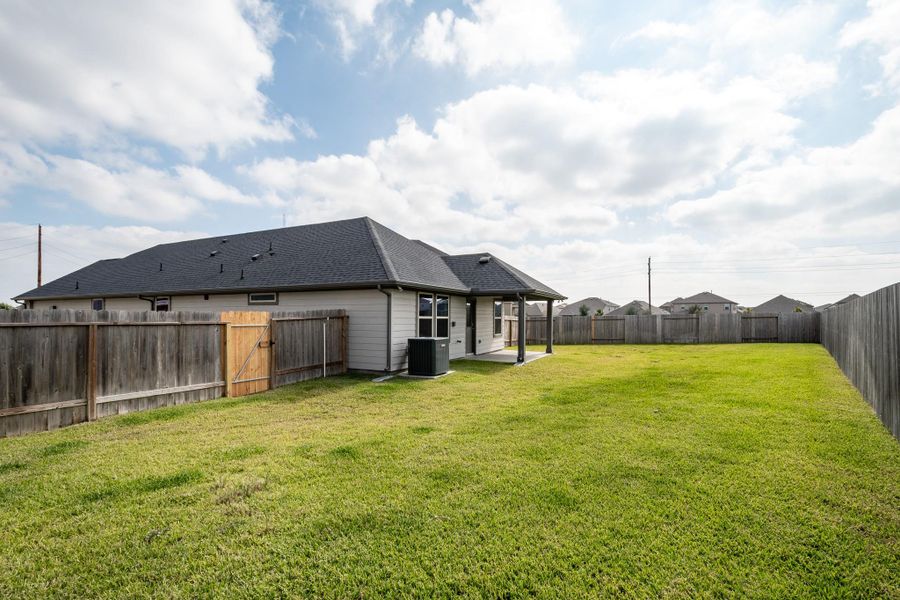 Exterior details and patio area of a home in Marisol, Katy (Image 26). Exterior details and patio area of a home in Marisol, Katy (Image 26).