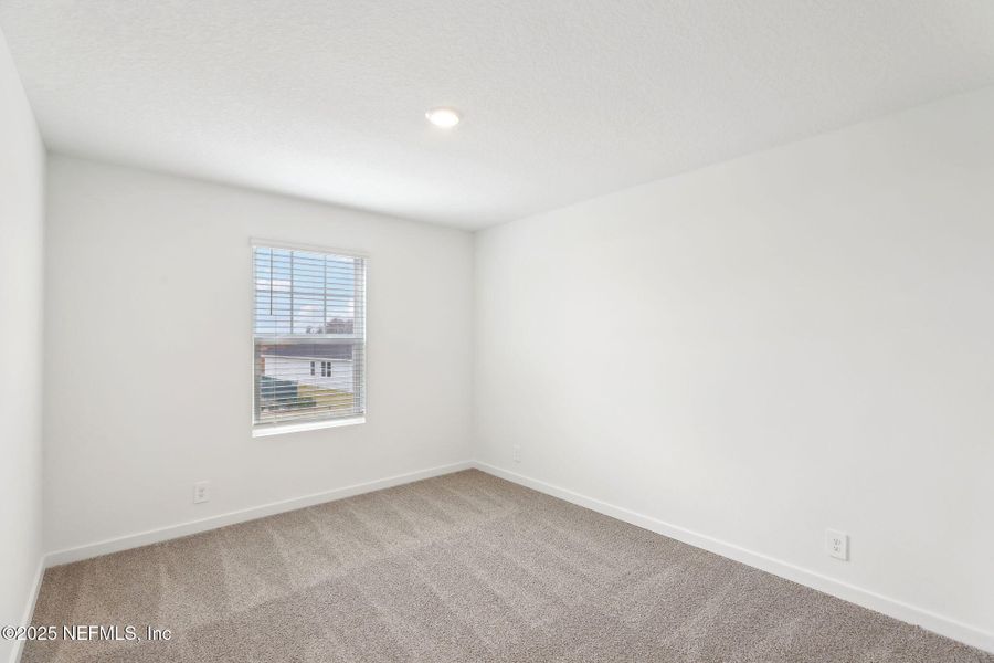 Spacious, unfurnished interior of a new home in Lakes at Bella Lago - Signature Series, Green Cove Springs (Image 35). Spacious, unfurnished interior of a new home in Lakes at Bella Lago - Signature Series, Green Cove Springs (Image 35).