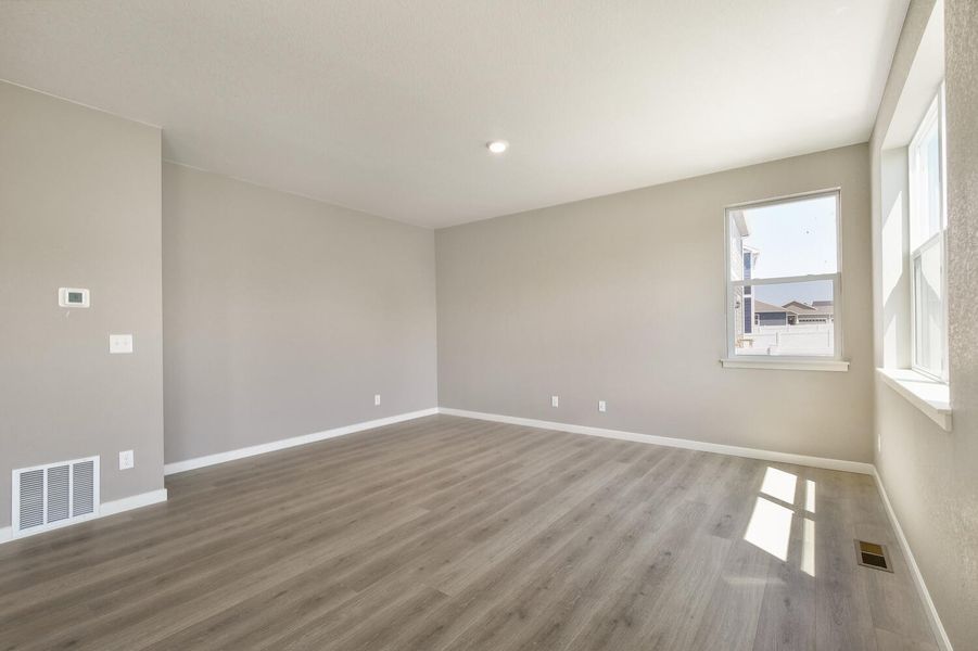 Representative unfurnished interior of a home built from the Holcombe by D.R. Horton in Brighton Crossing, Brighton (Image 16).