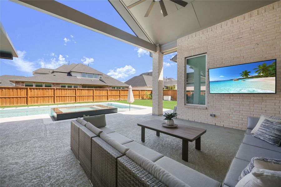 Exterior details and patio area of a home in Woodson’s Reserve, Spring (Image 3).
