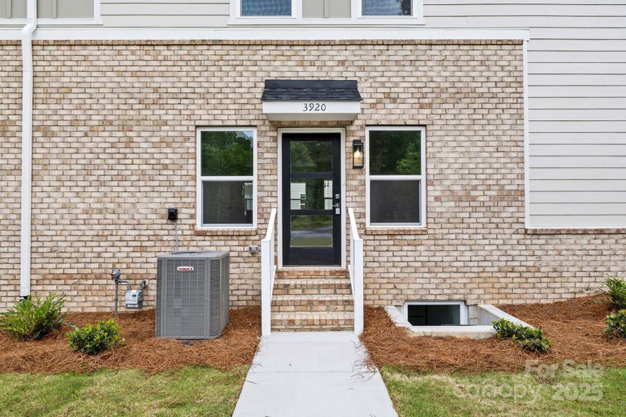 Front exterior of a new home in , Charlotte, NC, highlighting curb appeal (Image 21).